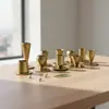 Atacado de Fábrica Castiçal de Metal Nórdico de Luxo Leve Cor de Latão Suporte de Vela de Ferro Forjado Decoração de Casa para Banquete de Casamento Transfronteiriço