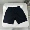 Comercio Exterior Color Sólido Estilo Nuevo Insignia Bordada Bolsillo Lateral Pantalones Cortos Deportivos Pantalones de Tres Cuartos Corte Holgado
