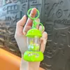 Llavero Exprimidor Transfronterizo Colgante Mini Fabricador de Jugos Juguete para Niños Encanto de Mochila Máquina de Garra Regalo Pequeño Al por Mayor
