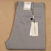 Pantalones casuales de algodón gris grueso de otoño, cálidos, de grosor medio, nuevos, elásticos, rectos, corte slim, para hombres jóvenes, de negocios
