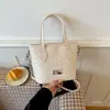2026 Moda Nueva Textura Tejida Cesta de Mano para Verduras Bolso para Mujer Sensación de Alta Gama Diseño de Nicho Bolso Versátil de Hombro Cruzado