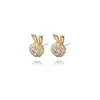 Aretes pequeños de conejo giratorios para correr a tiempo Estilo lindo de Año Nuevo Aguja de plata S925 no alérgica fabricantes al por mayor