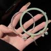 Nova Pulseira Estilo Chinês Estilo Antigo Pulseira Feminina Luxo Leve Design de Nicho Pulseira de Jade Sintético Pulseira Enrolada com Borla