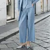 Pantalones anchos estilo Miyake con una caída lujosa, corte holgado, efecto adelgazante, longitud larga y un estilo relajado, chic sin esfuerzo que combina con todo.