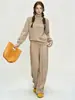 Conjunto casual de punto de color liso para mujer, nueva colección otoño/invierno 2026, con un suéter de media cremallera y pantalones de pierna ancha de cintura alta, un conjunto de dos piezas