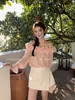 Camisa de un hombro suave estilo francés Ls para mujer Guangzhou Shisanxing Primavera 2026 Nuevo Top para mujer 22977