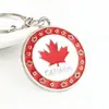 Llavero accesorio con colgante de hoja de arce canadiense en stock, decoración de aleación de zinc con recubrimiento de esmalte y decoración de goteo de aceite para bolsos y mochilas