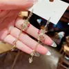 Pendientes largos de bolsa de dinero 2022 Nuevos Pendientes de borla de alto sentido pendientes pendientes de pin de plata de ley pendientes finos de moda cara mujeres