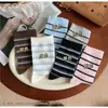 Meias Zhuji, coleção primavera e outono feminina, meias de cano médio, design fofo listrado, meias longas da moda e meias largas (slouch socks)