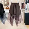 Roupas femininas plus size, coleção outono 2026, novos estilos para mulheres curvilíneas: patchwork de malha retrô, design assimétrico, cintura elástica e saia godê