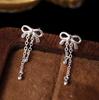 Moda e Moda Brincos de Laço Feminino Doce Grau Simples Joker Pequeno Design de Borla Feminino S925 Brincos de Agulha de Prata