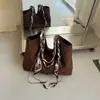 Bolsa Versátil de Moda Transfronteiriça Feminina Outono 2026 Nova Bolsa Tote Casual Retrô Super Quente para o Trabalho Bolsa de Ombro Único