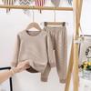 Otoño e invierno 2022 nuevo traje de ropa de otoño de terciopelo transpirable elástico suave para niños con rayas, superficie AB, ropa interior térmica para niños