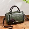Bolsa de almofada lisa retrô nova da primavera de 2025 bolsa feminina pingente floral bolsa de ombro transversal coreana uma geração de cabelo