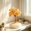 El fabricante está vendiendo grava de cristal natural, figuritas de árbol de la fortuna, bases de grava de porcelana blanca y rodajas de ágata, que se utilizan como decoraciones de oficina para atraer la riqueza.