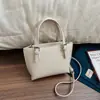 Bolso Cubo Estilo Coreano Sencillo con Patrón de Lichi para Mujer 2026 Primavera Nuevo Diseño de Nicho Bolso de Hombro Versátil