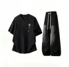 Traje de manga corta para niños, marca Ins de moda de verano, ropa holgada para hombre, un conjunto, combinación guapa, jeans de alta costura, conjunto de dos piezas