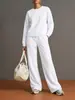 Conjunto de punto para mujer europeo y americano transfronterizo con cuello redondo, hombros caídos, manga larga y pantalones de pierna ancha de cintura alta, ajuste holgado, para ir al trabajo y estar en casa