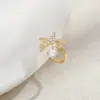 Brincos elegantes com zircônia incrustada banhados a ouro real, personalidade feminina, estrela-do-mar, sem furo, clipe de osso da orelha, simples, para combinar com tudo, brincos de clipe