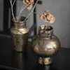Vaso de cerâmica rachada preto e dourado de luxo leve de Jingdezhen para sala de estar e quarto, adequado para flores cultivadas em água, peça de exibição decorativa para mesa de casa
