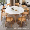Mesa y sillas de comedor sencillas y elegantes para uso doméstico, con un marco de madera maciza que se puede ajustar para adaptarse tanto a mesas cuadradas como redondas, con una superficie de mesa duradera de piedra para comer
