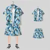 Camisa floral de manga corta, Ropa de playa de Hainan, Estilo hawaiano de Sanya, Conjunto de pantalones cortos finos de verano para hombre y pareja de viaje a Tailandia