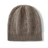 Cachemira otoño e invierno nuevo mujer alta gama color sólido tejido cálido moda patrón de onda pesada trenzado casual sombrero grueso