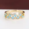 Venta Caliente Único Anillo Hueco de Turquesa Sintética Exquisito Anillo Índice de Cobre Incrustado con Circonita para Mujer Suministro Exclusivo Transfronterizo Venta Directa de Fábrica