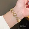 Pulsera Sencilla de Flor Hueca Irregular de Zircón Moda Retro Versátil Joyería de Lujo Ligero de Gama Alta