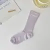 Calcetines de color liso con cordón estilo miu para mujer, calcetines de longitud media hasta la pantorrilla, calcetines de verano transpirables finos, estilo japonés, calcetines simples de felpa de verano