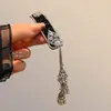 Pasador de Pelo con Borla de Campana Estilo Étnico Galaxia Plateada Brillante Retro Pinza Lateral para la Frente Dulce de Gama Alta Pinza Bb