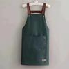 Delantal nuevo para hombres y mujeres LOGO Cocina Hogar Impermeable y a prueba de aceite Delantal de trabajo Ropa de trabajo Venta directa de fábrica