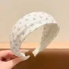 Diadema de punto floral de ala ancha estilo coreano para mujer, adecuada para el uso diario, cubre las uniones del cabello, diadema para lavarse la cara, dulce accesorio para el cabello
