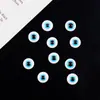 Venta al por mayor de fábrica resina ojo azul oblea Ojo Turco del Diablo ojo azul cuenta plana azul accesorios para ropa