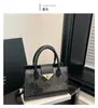 Nova Fivela de Fecho Estilo Patchwork Fashion Texturizado 2026 Bolsa Grande Feminina Simples e Estilosa de Ombro Transversal Bolsa Quadrada Pequena