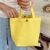 Bolso de Mano de Lona de Color Sólido Simple Personalizado de Fábrica para Mujer Bolso Tote Vintage Bolso Tote Casual Bolso Pequeño para Cosméticos