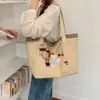 2026 Nuevo Bolso de Hombro Grande de Nicho para Mujer Sentido del Diseño Lindo Bolso Tote de Dibujos Animados Bolso Versátil Simple para Mujer