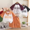 Novo estilo de verão para meninos, conjunto casual de duas peças com shorts de algodão de manga curta, atacado do fabricante, camisetas casuais 100% algodão