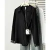Blusa de outono feminina plus size com um estiloso design coreano, apresentando patchwork de renda e mangas compridas