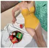 Venta al por mayor del fabricante Traje de baño de una pieza nuevo japonés y coreano con tirantes de triángulo Sexy hueco Push-Up Traje de baño para aguas termales para mujer Dulce