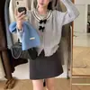 Estilo Francês Estilo Doce Laço Suave Waxy Casaco Suéter Feminino Outono e Inverno Gola Redonda Design de Renda Top de Tricô