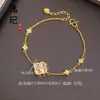 Pulsera de calabaza mariposa oro antiguo de alto color láser tienda de oro con joyería flash nicho lujo cuatro hojas