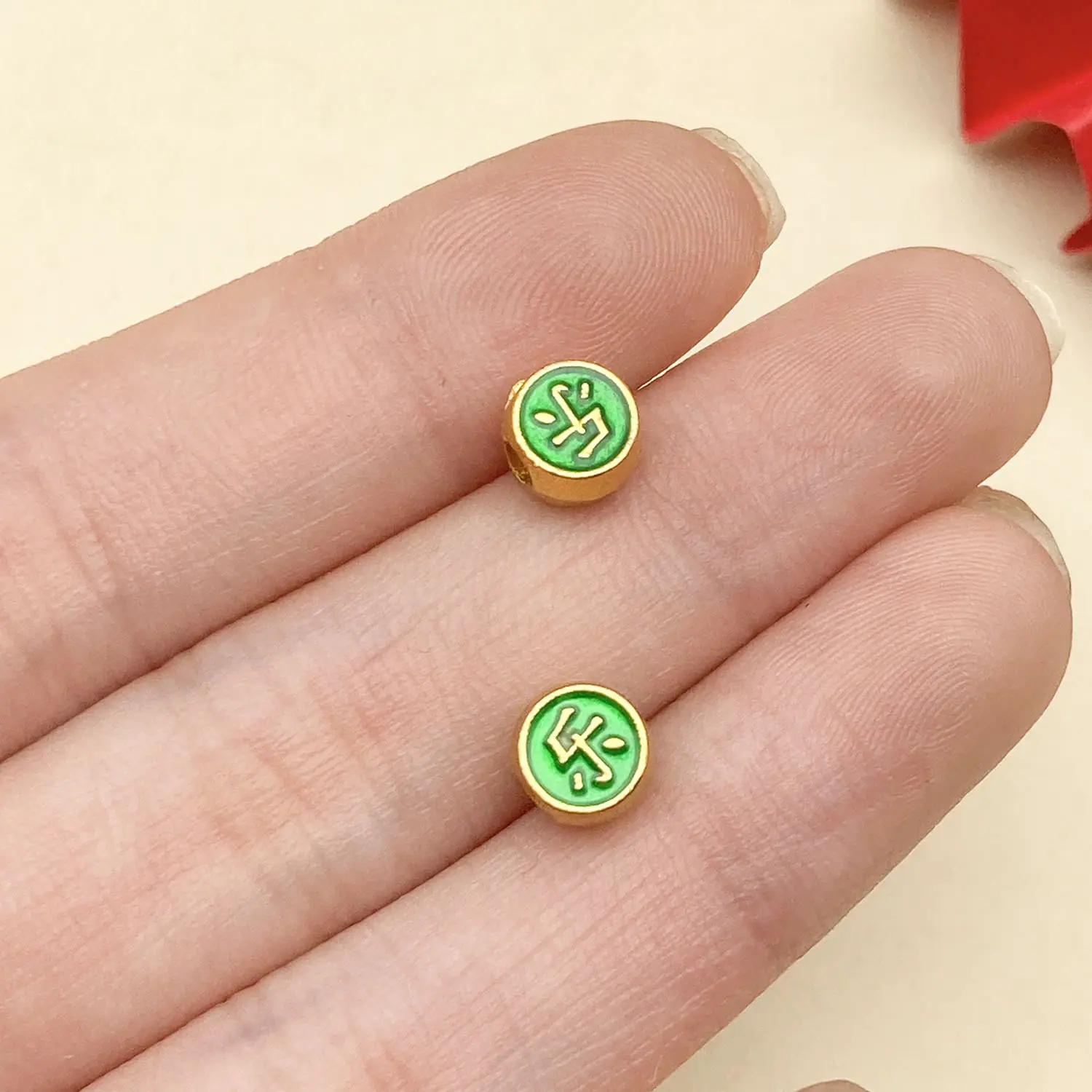 22676-ZY2-绿色滴油亮金双面横孔乐字间隔珠7x6mm