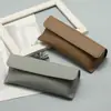 26 modelos de estojos de couro para óculos de grande capacidade com fecho magnético, disponíveis em várias cores, podem ser personalizados com um logotipo
