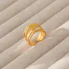 Anillo de acero de titanio ajustable con explosiones transfronterizas al por mayor anillo retro de acero inoxidable con presión de aceite apertura anillo de pareja para hombres y mujeres