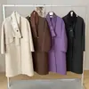 Estilo Hepburn retrô versão coreana novo casaco de cashmere dupla face outono e inverno casaco longo de lã lapela cachecol fitas
