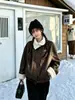 Abrigo de alta gama vintage de cuero PU y piel sintética de cordero integrado para mujer, nuevo estilo de invierno, corte holgado, forro polar y engrosado