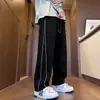 Nova coleção outono e inverno: calça casual masculina forrada com fleece, grossa, com listras refletivas, de perna larga - um estilo moderno e versátil, de corte solto e perna reta