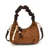 Bolso de Mano Plegado de Alto Valor de Moda Estilo Coreano 2025 Bolso Dumpling de Gamuza Nicho Bolso de Hombro Cruzado Retro Mate