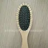 Peine de aire peine de cojín de aire peine de masaje con bolsa de aire de diente de nailon de madera de loto